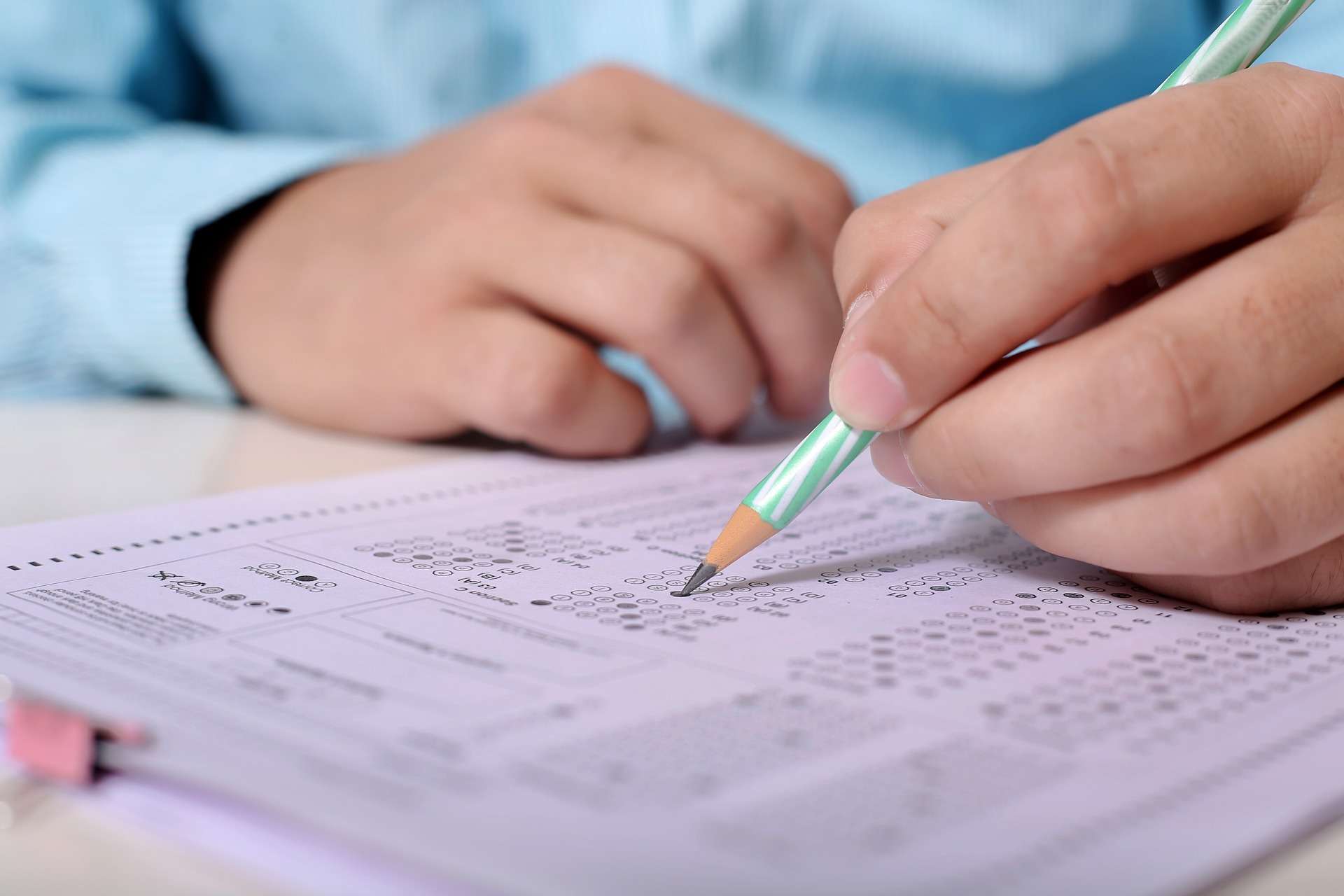 A person taking an official, proctored admissions test to determine their IQ for Mensa.